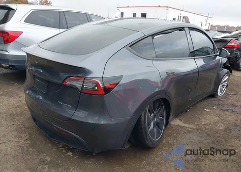 2023 Tesla Model Y Awd/Long Range Dual Motor All-Wheel Drive z USA, uszkodzony, nr VIN 7SAYGDEE8PA176641